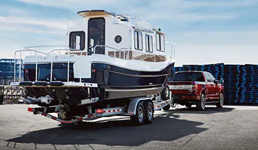 2022 Nissan TITAN Truck towing boat | Don Moore Nissan in Owensboro KY