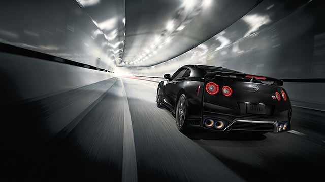 2023 Nissan GT-R seen from behind driving through a tunnel | Don Moore Nissan in Owensboro KY